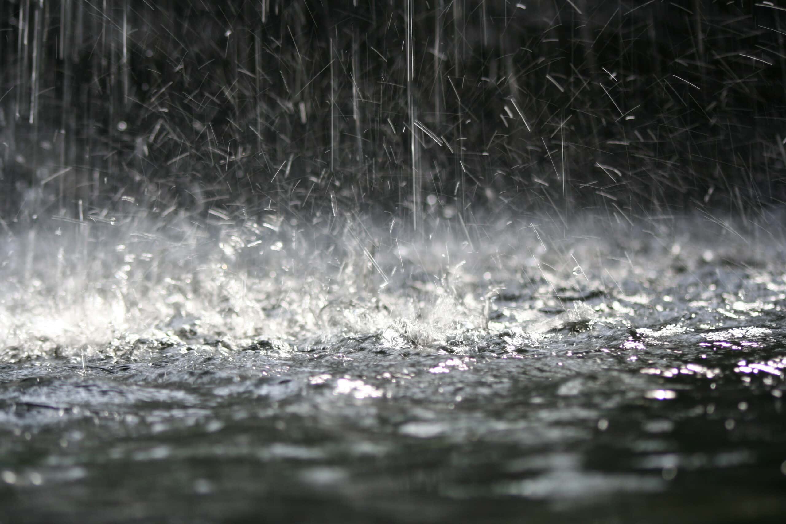 Rain splashing on a road